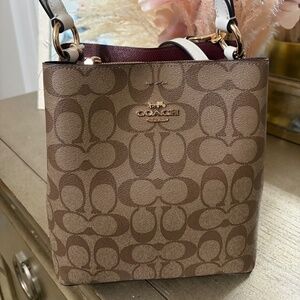 Never worn Coach Bucket Bag